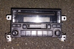 Subaru WRX 2002-2005 OEM CD 6-disk, Radio, cassette player head unit. Surface rust on metal.