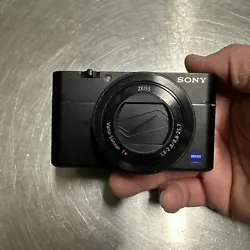 Sony Cyber-shot DSC-RX100 20.2MP Compact Digital Camera - Black. Used normal wear a tear ni cracks works great.