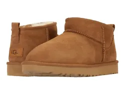 Style #: 1116109. Leather heel label with embossed UGG® logo. Treadlite by UGG™ outsole. Suede heel counter.