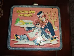 1973 Raggedy Ann & Andy Metal Lunch Box With Thermos. Has some rust and scratches the thermos Is quite faded.