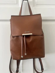 Gorgeous and practical GUESS backpack. Gently used. Has back zipper and internet has another zipper pocket and 2 open...