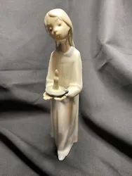 Lladro Porcelain Figurine Girl With Candle 4868, Glossy finish, Retired. No box Figure great shape! No damage Will be...