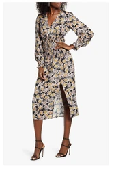 Long sleeves with smocked cuffs. Smocked, tiered waist. 49