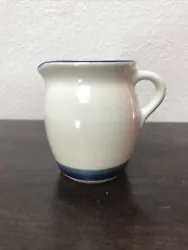 Vintage Pfaltzgraff Creamer Pitcher Blue Green Stripe. Item is in good preowned condition with no cracks or chips....