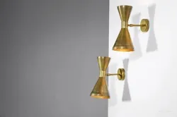 Introducing Brass Flambeau Light in Italian stilnovo kalmar minimalist style wall lamp. Which contains unique feature &...