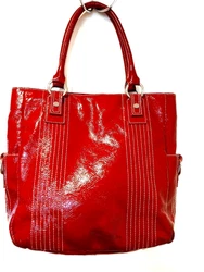 There are acouple of small ink marks on the bottom interior and the outer bottom edges have darkened a bit. DARK RED...