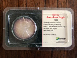 2001 Silver American EagleUncirculated but discoloredPackaged by Littleton Coin Company
