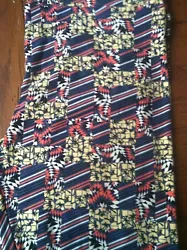 BNWOT LuLaRoe TC2 leggings colorblocked print of palm trees on yellow background & blue, pink, and white stripes. Made...