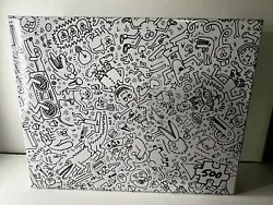 Explore the world of pop art with this 500 piece puzzle, featuring the vibrant designs of Keith Haring. Made by Vilac...
