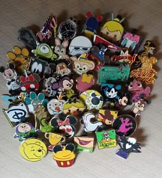 All have the rubber Mickey head back and the Pin Trading Logo.