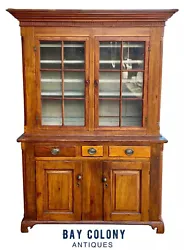18TH CENTURY ANTIQUE PENNSYLVANIA POPLAR CHIPPENDALE PEWTER CUPBOARD / CABINET. The cabinet has a complex molded crown...