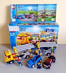 Lego City 60060 - Le camion Transporteur de véhicules. Livré avec les notices et la boite dorigine. Lego en très bon...