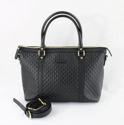 Gucci authentic black leather GG satchel handbag. Detachable crossbody strap. Gucci logo patch on upper front. modern &...