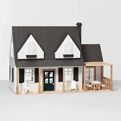 •Farmhouse-style dollhouse will be an instant classic •Mix of natural and painted wood has a simple, rustic feel...