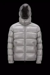 Felt Moncler logo on sleeve. Flap patch pocket on sleeve. Detachable hood with snap buttons, adjustable with drawstring...