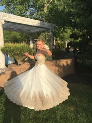 As the pictures show, this dress has a full skirt of tulle. No one recognized her, it was a total transformation from...