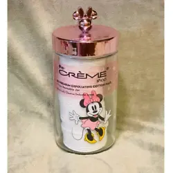 Cute glass jar features a happy Minnie Mouse pictured, pink lid with a mirror like finish & Minnie head handle. Jar...