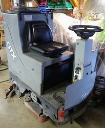 factory cat floor scrubber. Under 2000 hours. Brand new battery pack, vacuum motor and seat. Well maintained machine....