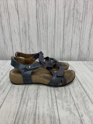 Elevate your summer fashion with these stunning blue Taos Trulie wedge sandals. Perfect for women who want to look...