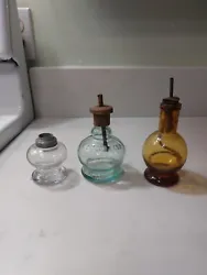 For sale, I have 3 antique mini oil lamps as pictured. No chips or cracks. The tallest measure about 5