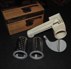 Pampered Chef Deluxe Cheese Grater 1275. Good, clean pre-owned condition. Sold as pictured.