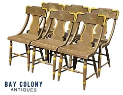 The chairs were repainted, probably around the 70’s or 80’s, in an earthen brown color with yellow, green, & black...