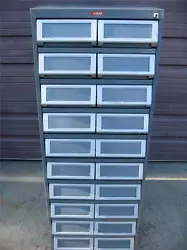 Has a total of ten double pull out drawers (20). Pull out drawer guides with bearings. All drawers work properly and...