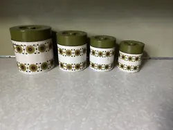 Mid Century Modern MCM Nesting Kitchen Tin Metal Canister Set Avocado Green. Condition is Used. Shipped with USPS...