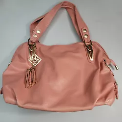 Angel Kiss Purse Peach Womans with Extended Strap. Strap Drop: 13 in. One outer pocket with Zipper. Height: 10 in.