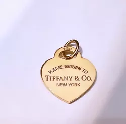 18K Gold 1” Tiffany & Co. Return to Tiffany Heart pendant. Flawless New condition with pouch box and ribbon.Heart...