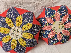 The pillows feature a unique combination of colorful floral patterns in a round shape, making them a perfect addition...