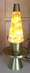 The surfaces are clean, and free of any dings or wear. The lamp works properly, and bubbles are a beige color. Has...
