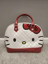 2013 Loungefly Hello Kitty Face Dome Style Handbag with defects. Small black marks on the front and faded black hardly...