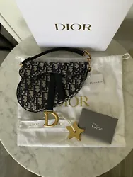Like New condition 2020 Dior Mini Saddle Bag Blue Oblique Jacquard.. Received as gift. Wore around the house with strap...