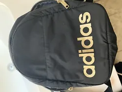 adidas mini black gold backpack. Never been used; no tags.