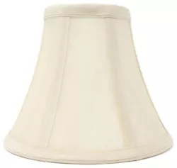 The traditional bell shades bring calm to any classic room setting. Clip on to Candelabra bulbs. Silk cream color with...