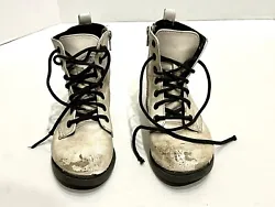 Girls size 13 combat boots, very worn very scuffed. Hole in bottom of shoes. See pictures for imperfections. Worn in...