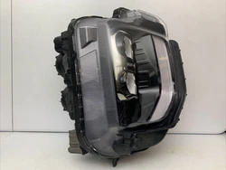 Up for sale is a used headlight for parts only. It is a right passenger side headlight. This is a genuine authentic...