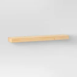 Bring practical and stylish storage to any living space with this Floating Wood Shelf from Threshold. This solid wood...