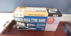 Up for sale is a new in the box Multi Axle Tyre Gard - Tire Cover. White. Size Small Double Axle. Some storage wear on...