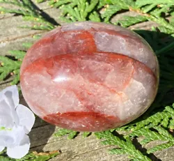 The Hematoid infused into the Clear Quartz may aid to balance the mind and bring clarity to emotions. WEIGHT: 110g....