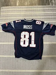 NFL Patriots XL Moss Jersey. Condition is Used. Shipped with USPS Ground Advantage.