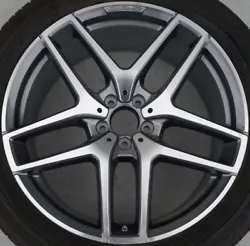 There are no scratches, dents, dings, or other blemishes. This is an OEM wheel with an original stamp AND part number....