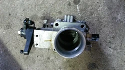 Up for grabs, I have a throttle body removed from a running 2002 70 HP Suzuki outboard. The part is in good condition....