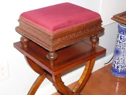 Antique Victorian Footstool Stool Ottoman with Burgundy velvet upholstered top above a solid Walnut base that has a...