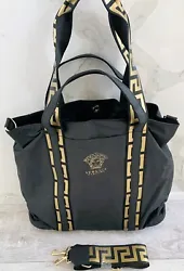 You cant go wrong with this fabulous faux leather tote from Versace Parfums. This is an outstanding versatile bag that...