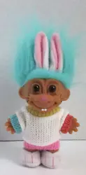 The original owner displayed this troll so no wear. SWEATER BUNNY WITH BOOTS.