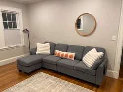 Gray HonBay Couch with Chaise. Brand new, hardly used. No rips, stains or tares..