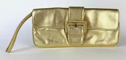 Authentic HOBO INTERNATIONAL Runway gold leather clutch purse with magnetic close on bow flap. Interior is paisley...