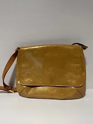 Authentic Louis Vuitton Vernis Thompson Yellow Shoulder Bag Made In Spain. Condition is Pre-owned. Shipped with USPS...